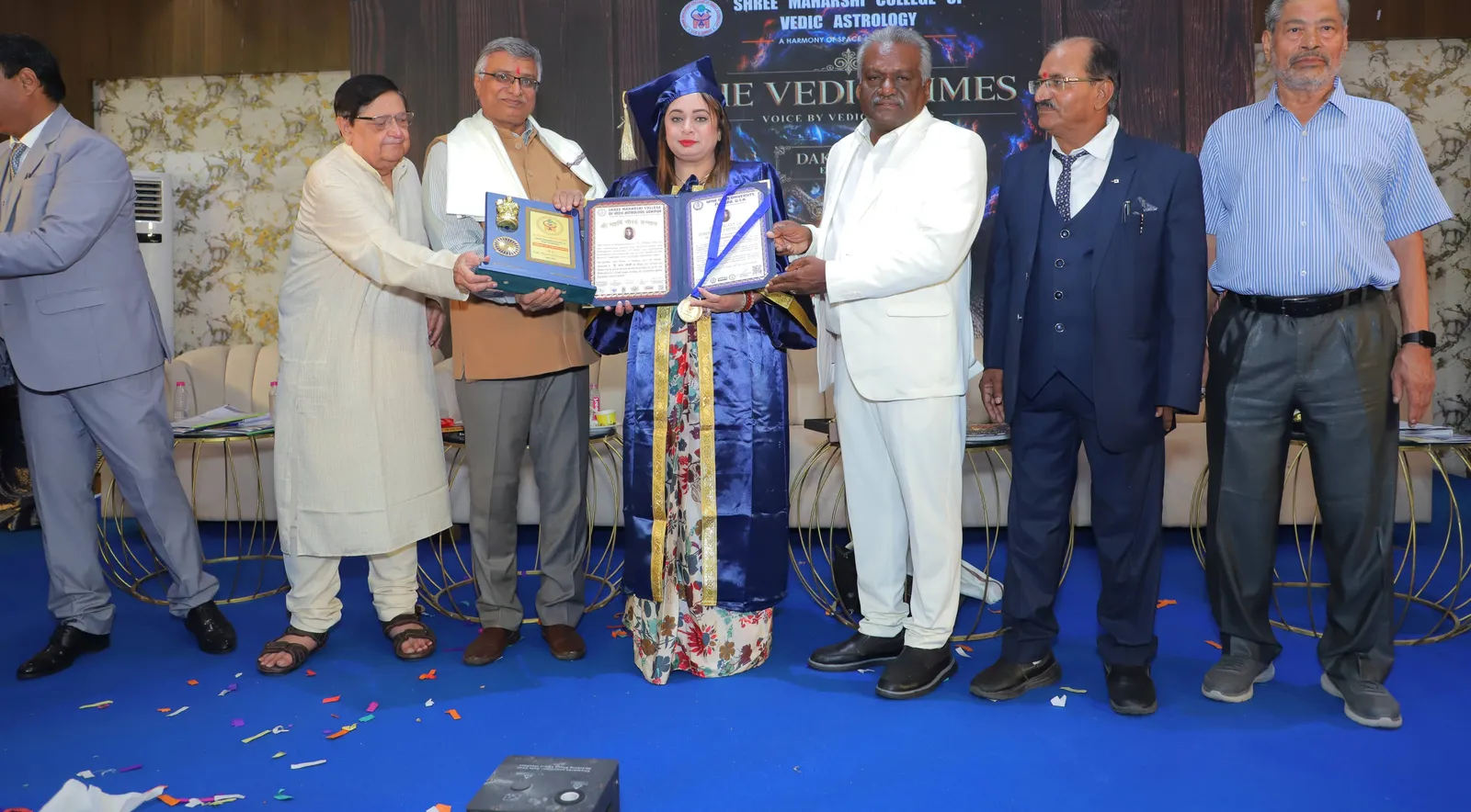 Dr. Dhhara Sooni receiving her Ph.D. honours on stage at the 6th Convocation